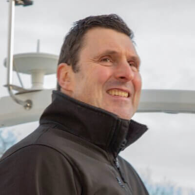picture of staff member on boat