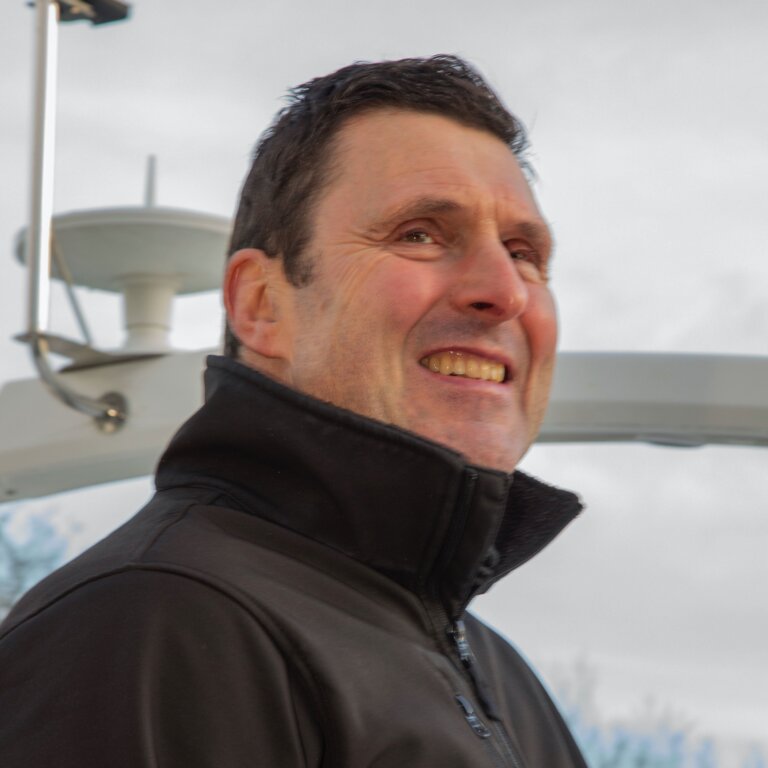 picture of staff member on boat