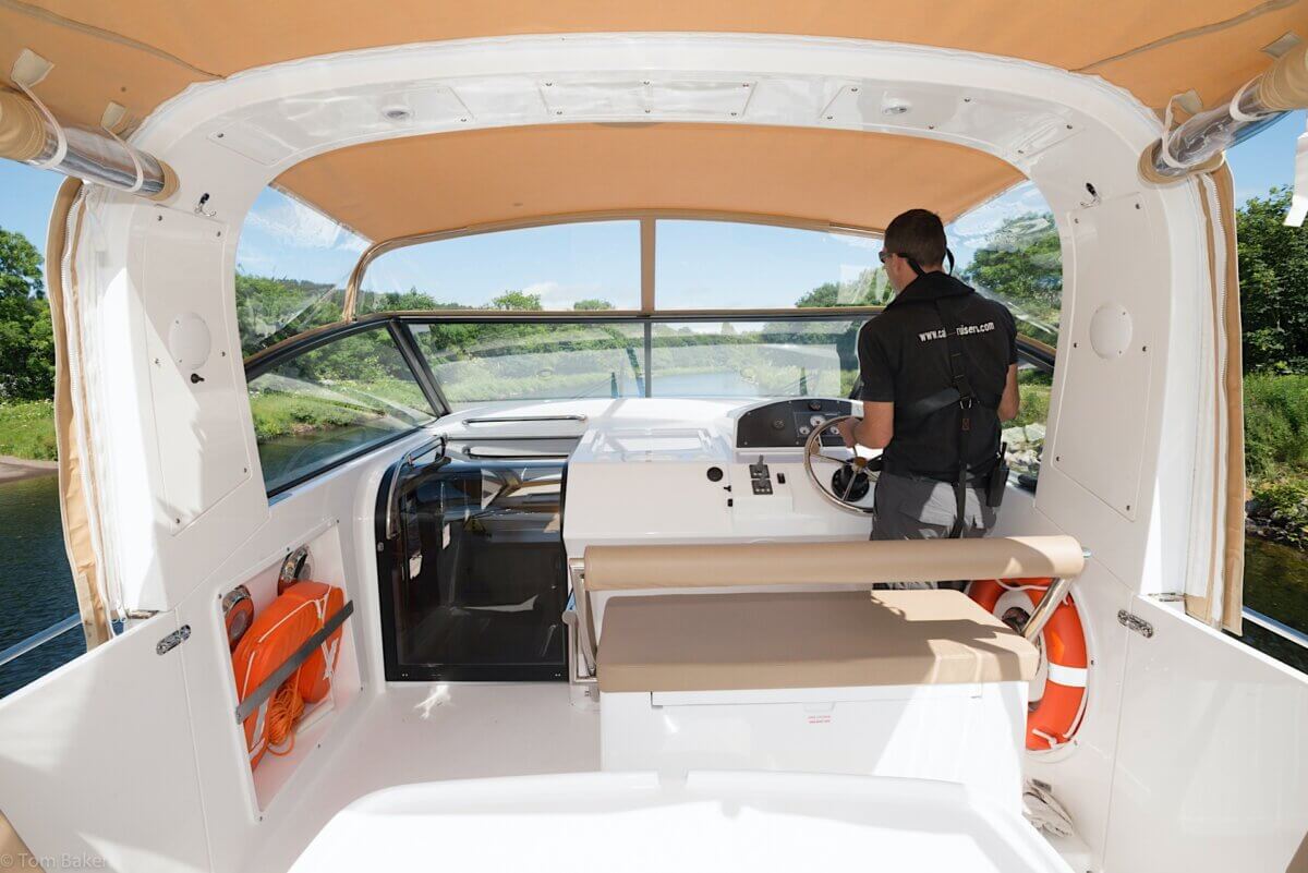 staff driving boat for hire